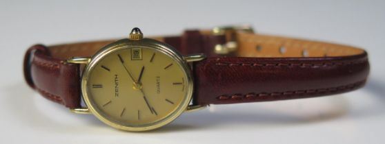 A ZENITH Ladies 9ct Gold Wristwatch with quartz movement, 24x20mm 9K gold case, back no.