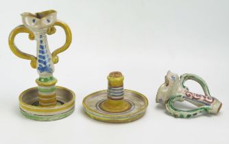 Two 18th century style Sicilian anthropomorphic majolica twin-handled candlesticks, with shaped