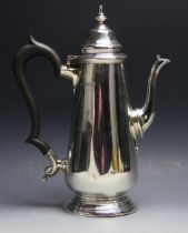 A George V silver coffee pot, maker Harrods Stores Ltd, London, 1913, of cylindrical tapering