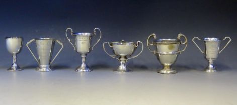 Six assorted 20th century silver miniature trophy cups, various makers and dates, total weight of