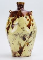 A large terracotta vase of Japanese influence, with brushed abstract decoration to the ovoid body,