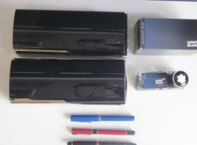 A Mont Blanc fountain pen contained in its case with box, a bottle of Mont Blanc Midnight Blue