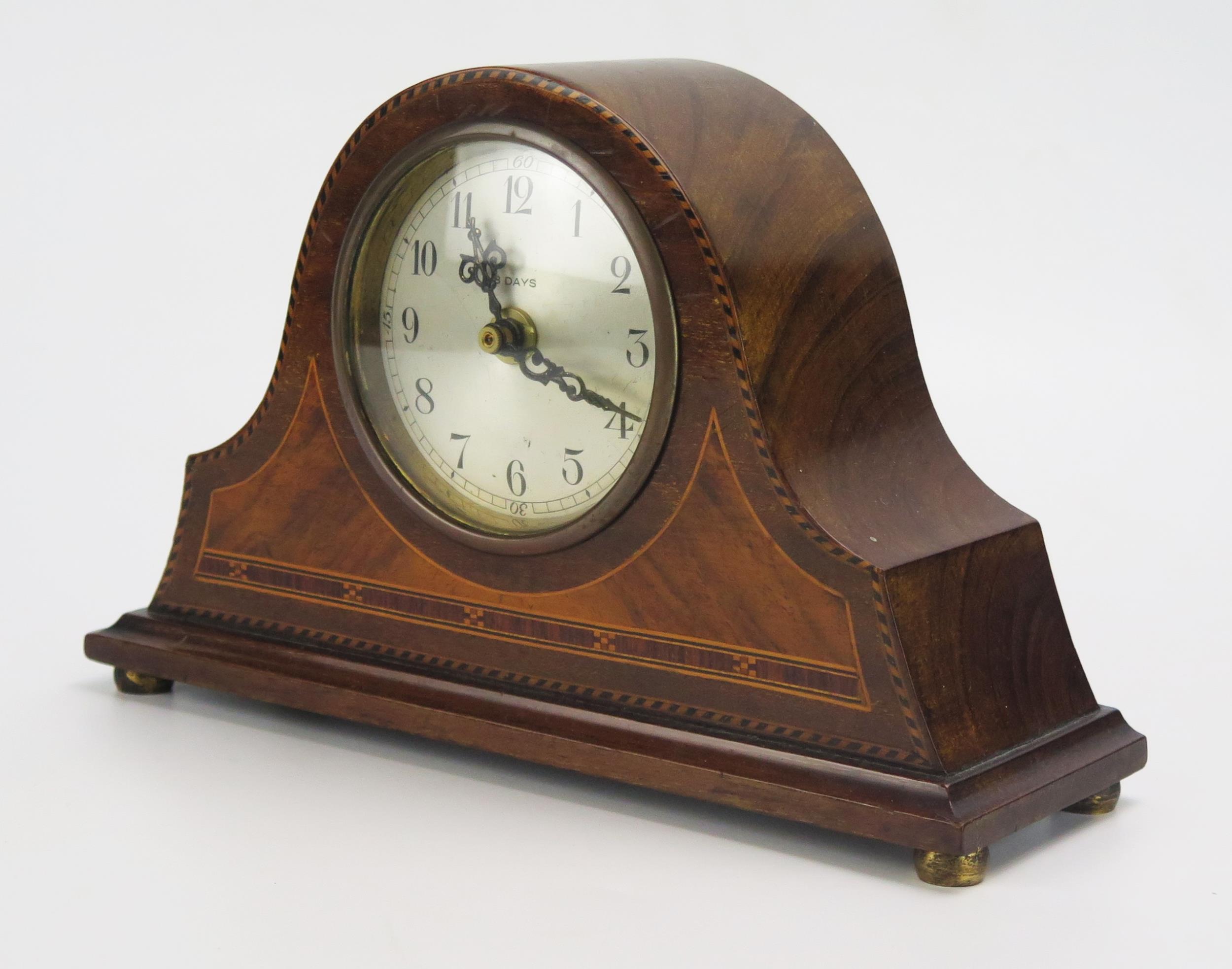 An Edwardian mahogany and chequered strung mantel clock of arched outline with 8cm silvered Arabic - Image 2 of 2