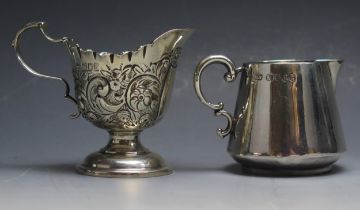 A Victorian silver cream jug maker J B possibly Jane Brownett, London, 1883, 7.5cm long, together