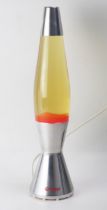 A Mathmos Astro Baby lava lamp, of ovoid form on a waisted brushed chrome base, 43cm high.