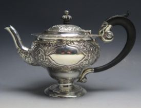 A Victorian silver pedestal teapot, maker George Nathan & Ridley Hayes, Chester, 1898, with embossed