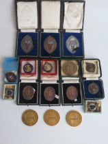 A collection of bronze and other medallions and awards, most boxed or cased. (a lot)