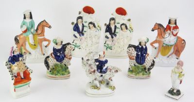 A collection of assorted miniature Staffordshire spill vases, figures on horseback and single