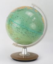 A 1970's Phillips plastic 8ins terrestrial globe, on a circular plastic stand, 28cm high.