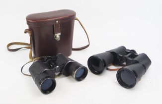 A pair of Carl Zeiss 10 x 50 field glasses in a stitched leather carrying case, A pair of
