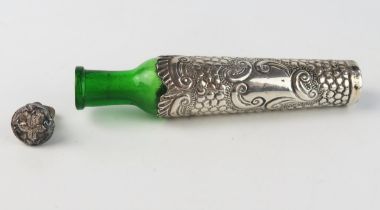 An Edward VII green glass and silver mounted scent bottle13.5cm long. and stopper, all marks worn,