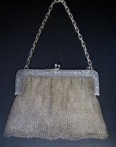 A Continental silver mesh purse, bears import mark for London, 1910, 13cm diameter, 194gms, 6.26ozs.