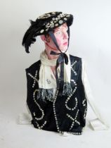 A pearly queen outfit, includes waistcoat, skirt, blouse bonnet and silk scarf. size 14.