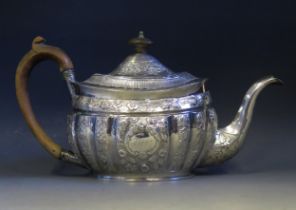 A George III silver teapot, maker Thomas Johnson, London, 1805, monogrammed, of oval lobed form with