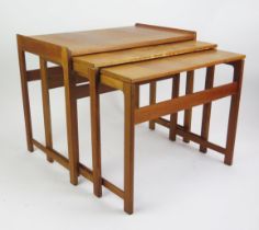 A 1960's Danish Teak Nest of Three Tables, MADE IN DENMARK stamped mark to the smallest, largest