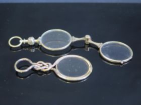A pair of 19th century gilt metal framed lorgnettes, together with a gilt metal framed monocle. (2).