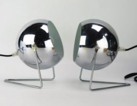 A pair of polished chrome globe table lamps, on V-shaped stands, 16cm diameter.