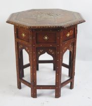 An Indian hard wood, ebony and bone inlaid tiffin table of octagonal outline, the top with inlaid