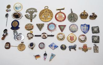 A collection of assorted enamel lapel and other badges, Masonic jewel etc.