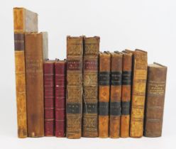 A collection of leather bindings, includes Voyages and Travels Throughout The Continent & Islands of