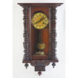 A late 19th century mahogany wall clock, with 14cm Roman dial, the movement with grid iron