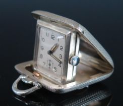A George V silver cased travelling timepiece, maker SSM, Birmingham, 1935, with 2.25cm Arabic dial