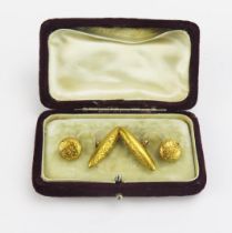 A Pair of Victorian 15ct Gold Cufflinks with chased foliate decoration, Birmingham 1900, H.W.LD,
