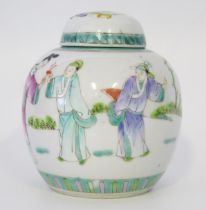 A Chinese Famille verte decorated ginger jar and cover, decorated with figures in a garden