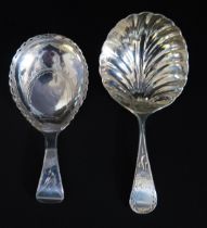 A George III silver caddy spoon, maker George Smith II & Thomas Hayter, London, 1800, and another