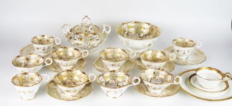 A Davenport part tea service, with gilt floral decoration, includes six cups, three coffee cups,