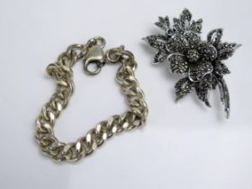 A Silver and Marcasite floral Brooch (57.8mm) and a silver chain, c. 56g