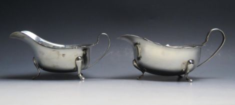 A George V silver sauce boat, maker Adie Bros Ltd, Birmingham, 1935, of traditional design with wavy