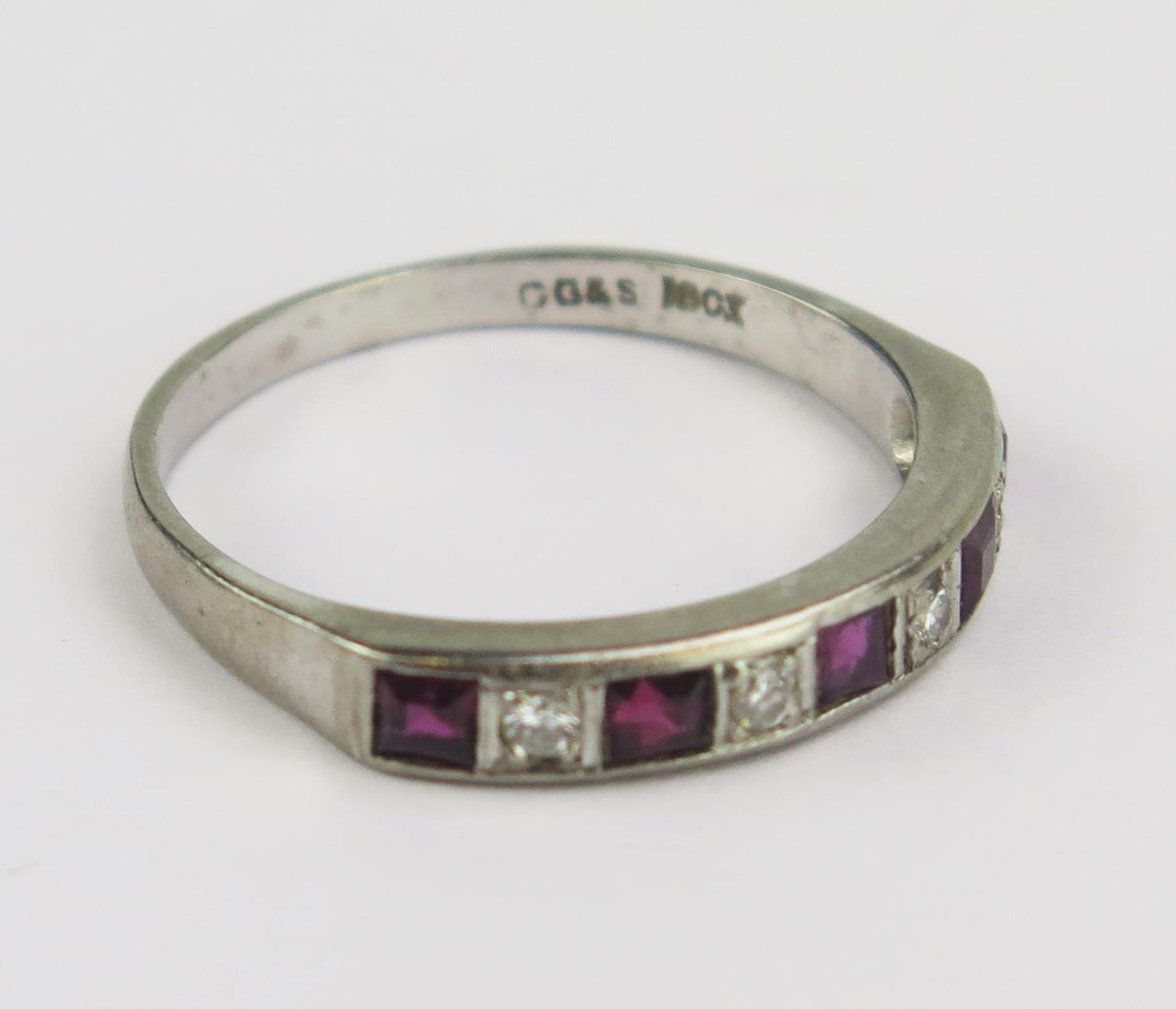 An 18ct White Gold, Ruby and Diamond Half Eternity Ring, 4mm wide band, stamped 18CT, maker G&S, U. - Bild 2 aus 2