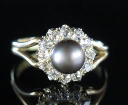 An Antique Natural Saltwater Black Pearl and Old Cut Diamond Cluster Ring, 6.7mm pearl, c. 2.3mm old