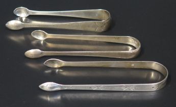 A pair of George III silver sugar tongs, maker Peter and Ann Bateman, London, 1796, another pair