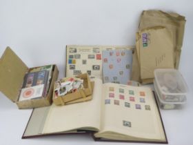An Album of British, Commonwealth, dominions and world postage stamps together with loose stamps.