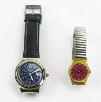 A SWATCH Irony Happy Joe YSG400 Wristwatch and ladies Swatch. Both needing battery, not tested