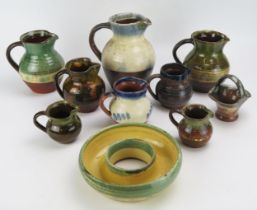 A collection of Watisfield and other ceramic wares.