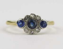 An 18ct Gold, Sapphire and Diamond Ring, c. 3.7mm principal stone, 11.8x8mm head, stamped 18CT PLAT,