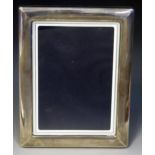 An Elizabeth II silver photograph frame, maker Francis Howard Ltd, Sheffield, 1988, 22.5 x 17.5cm.