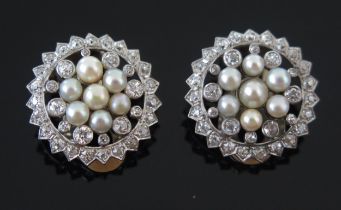 A Pair of Pearl or Cultured Pearl and Diamond Clip Earrings in precious white metal settings, 2.