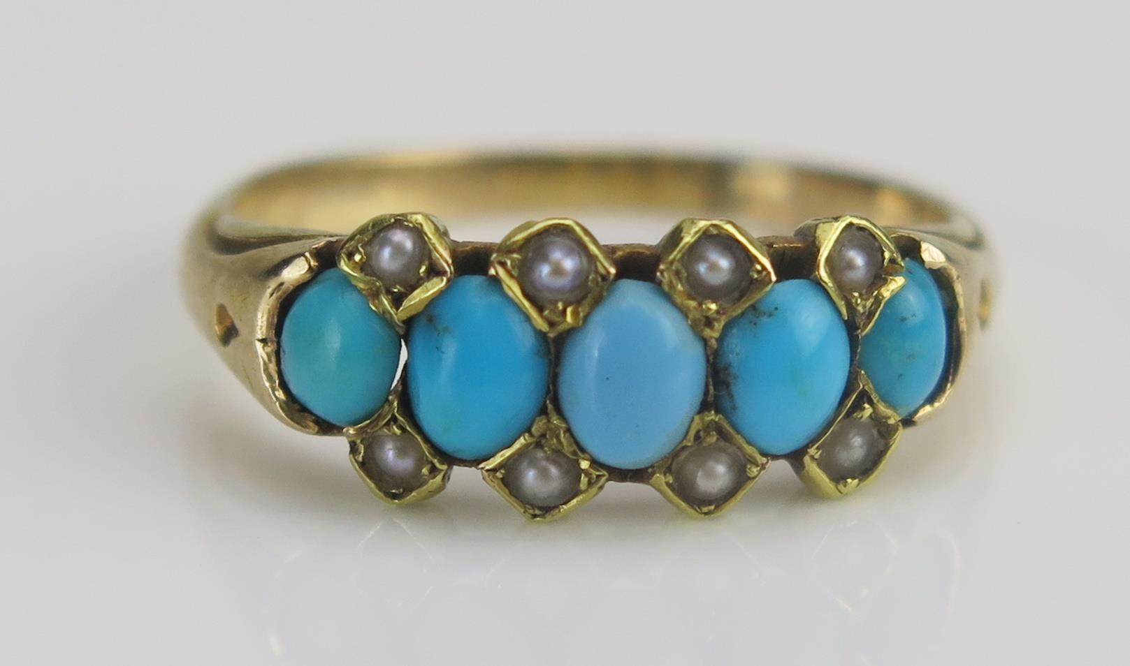 A Victorian Turquoise and Seed Pearl or Cultured Seed Pearl Ring in a precious yellow metal setting,