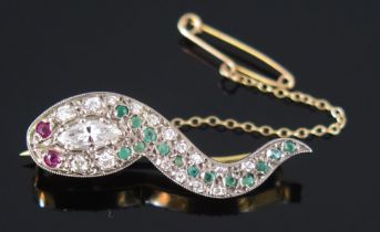 A Diamond, Ruby and Emerald Tadpole Brooch in a precious yellow and white metal setting, the head