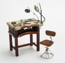 A novelty miniature wood and silver model of a jewellers work table and chair, stamped marks, with