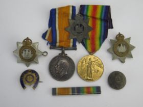 A World War I Pair to 24637. Pte. J Felton. Devon R., War and Victory Medals together with cap