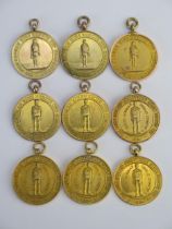 Of Mining and Military Interest _ Nine 9ct Gold Mines Rescue Cup Medallions awarded to Joshua Payton