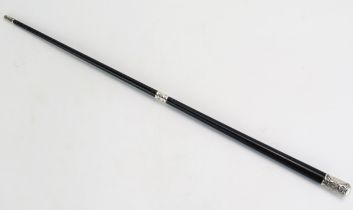 A Victorian ebonised and silver mounted conductor's baton, inscribed 'Presented to Mr. B. Rundle