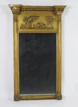 A Regency period gilt wood and gesso pier glass, the pediment of inverted breakfront outline with