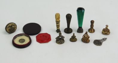 A collection of 19th century and later seals, includes bone handled seal, green glass handled