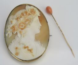 An Antique Shell Cameo Brooch decorated with the bust of a lady in profile and in a precious